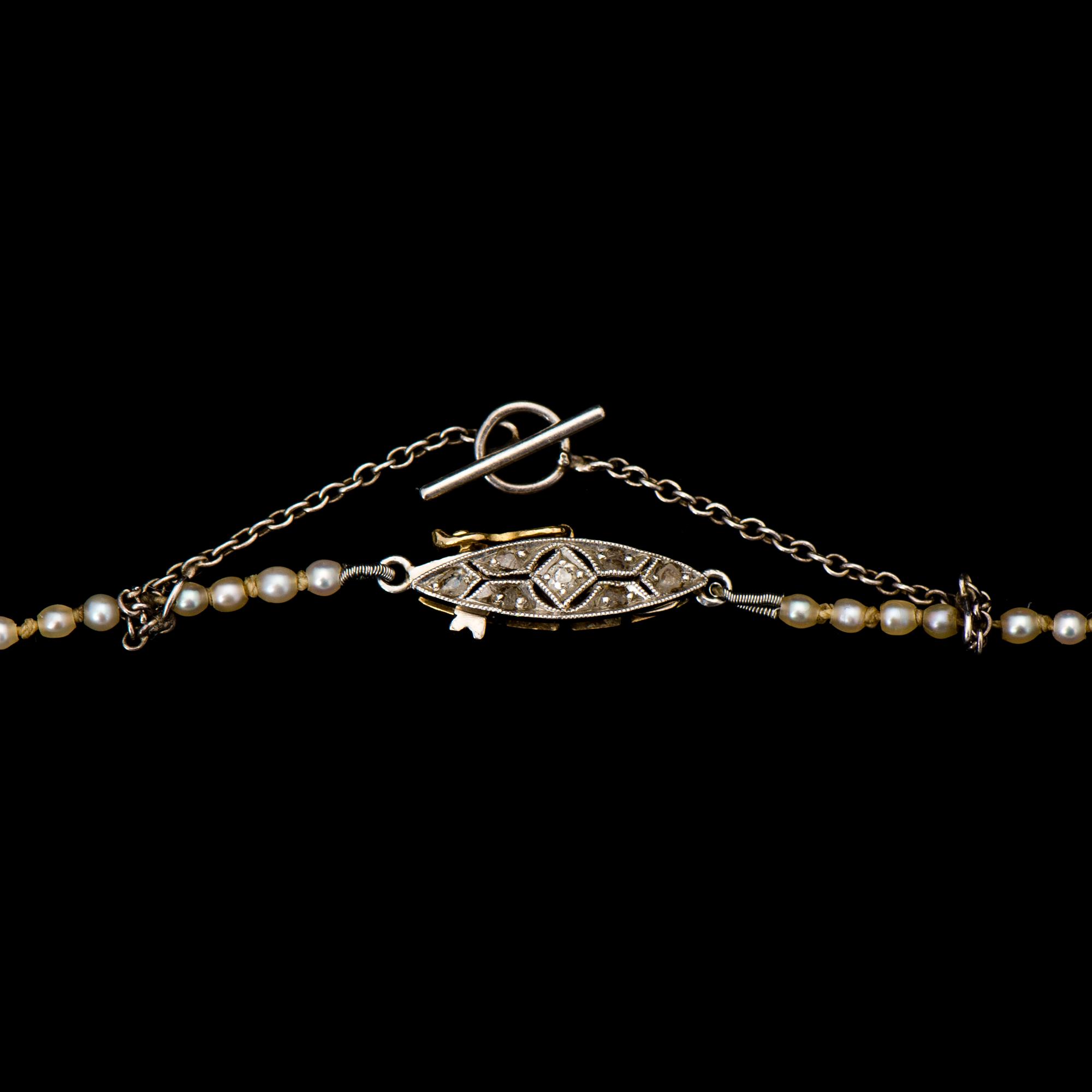 PÄRLCOLLIER, orientaliska pärlor, lås 18k guld med rosenslipade diamanter.