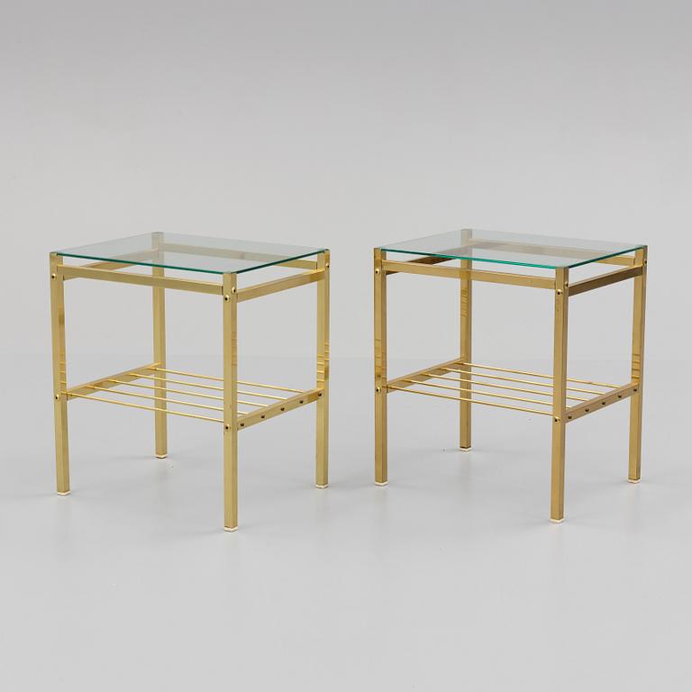 A pair of brass and glass tables, second half of the 20th century.
