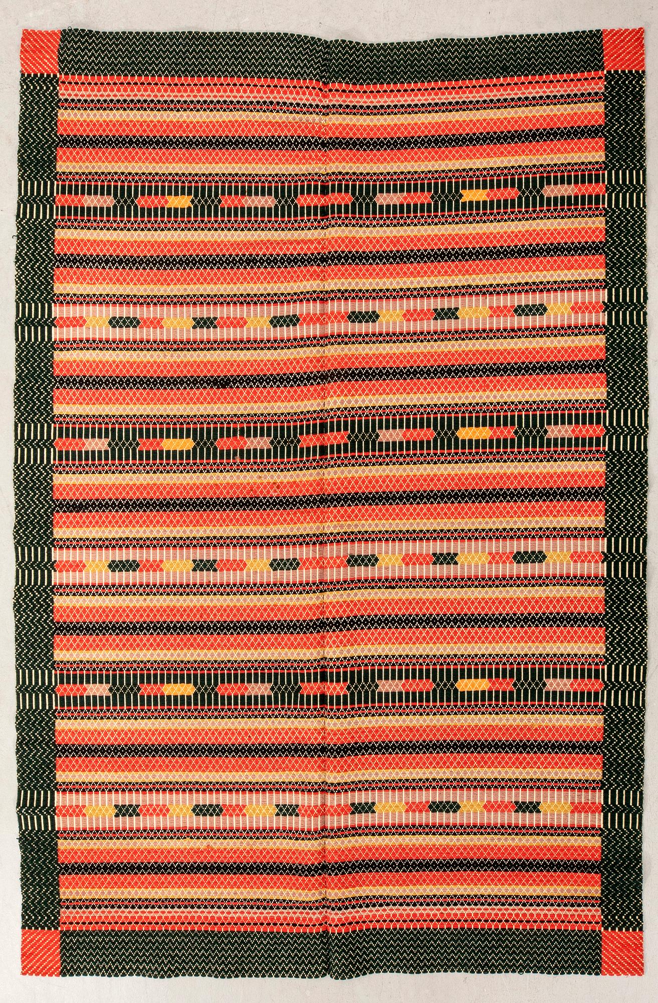 Quilt, Scania circa 1900, composed of two stitched panels, 169x137 cm, signed.