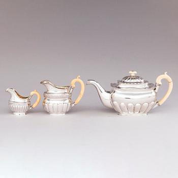 A Russian silver teapot and two silver milk jugs, St Petersburg 1824-1839, jugs marked Georg Randelin and Thomas Sohka.