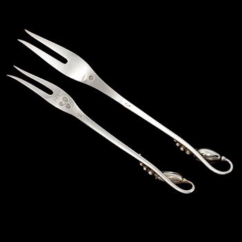 SERVERINGSBESTICK, 2 st, sterlingsilver, "Magnolia/Blossom", Georg Jensen, Danmark. Vikt 40 g.