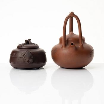Two Chinese yixing teapots, early 1900s and 1980s.