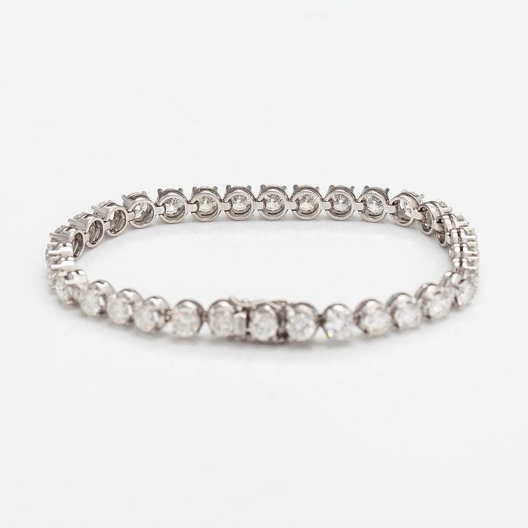 Tennisrannekoru, 18K valkokultaa ja briljanttihiottuja timantteja n. 7.50 ct yht.