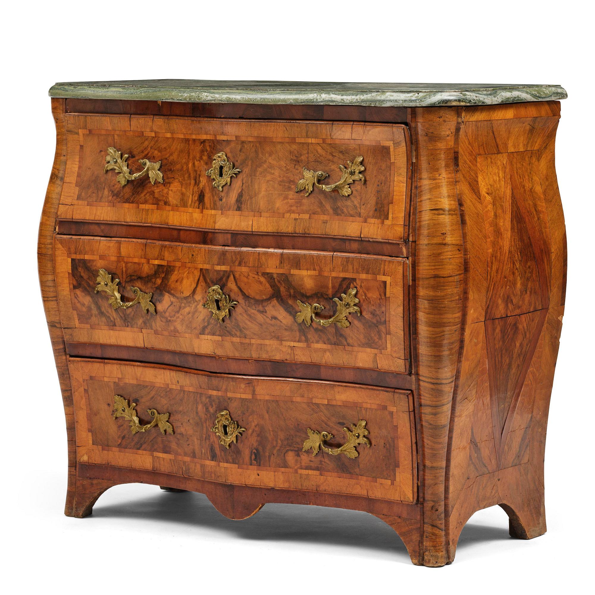 A Swedish rococo parquetry commode by C. Linning (master in Stockholm 1744-79).