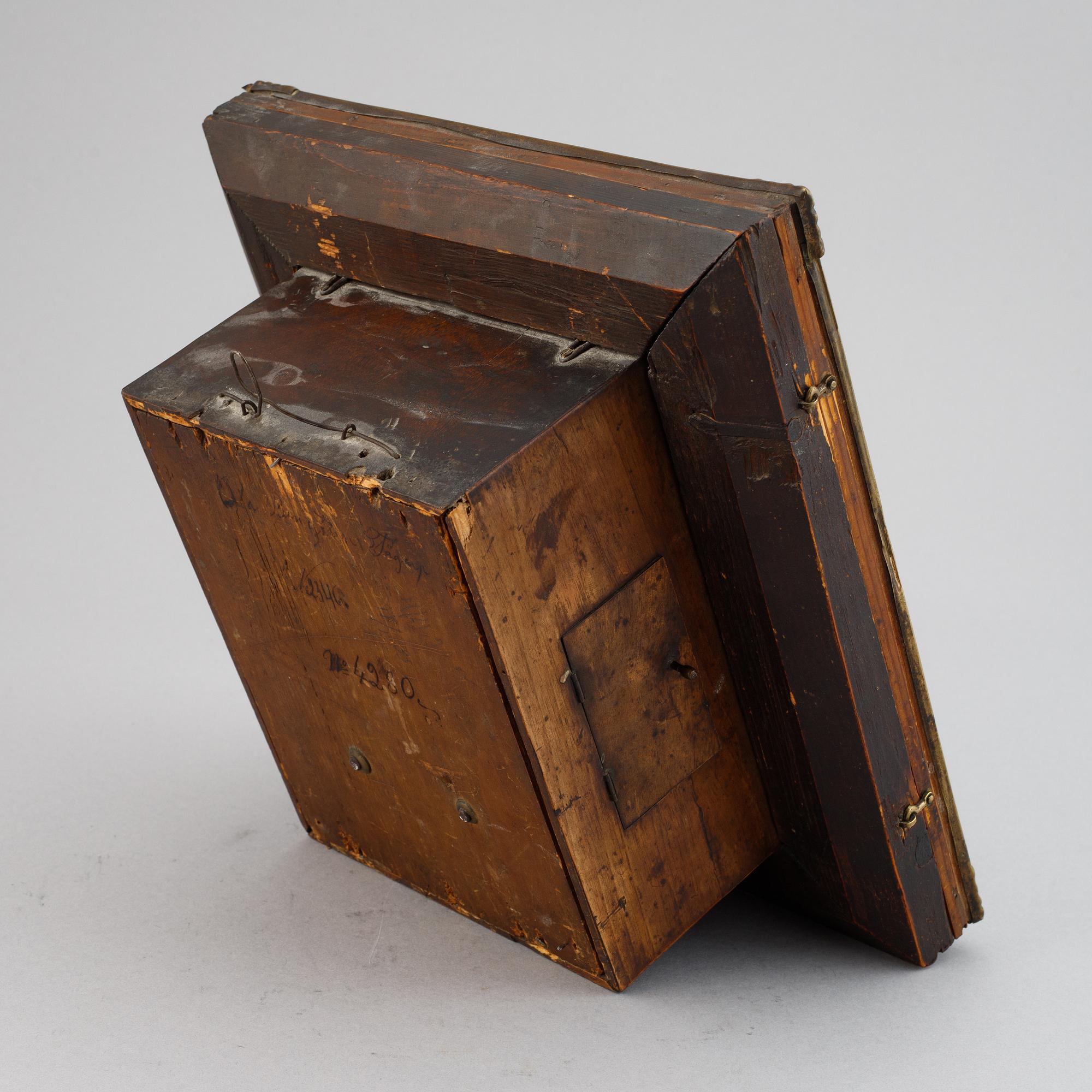 A Schwarzwald area wall pendulum clock with mechanical eye-movment, mid 19thcentury.