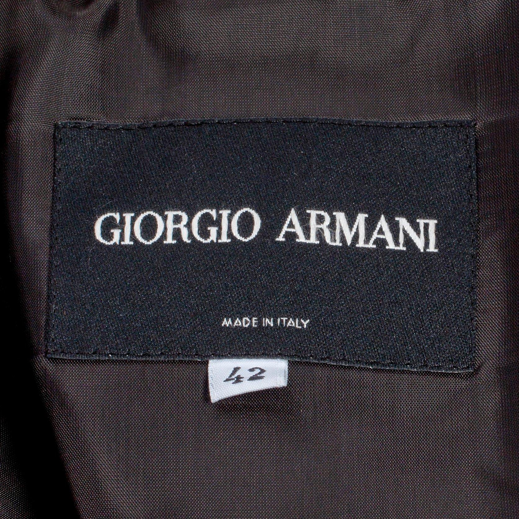 GIORGIO ARMANI, a grey corduroy two-piece suit consisting of jacket and pants.
