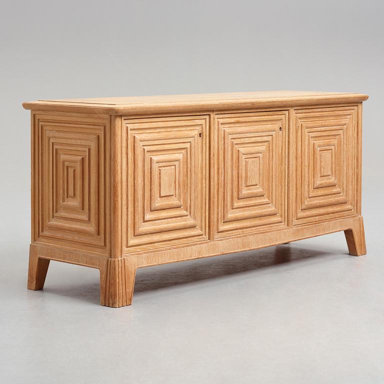 Oscar Nilsson, attributed to, an oak Swedish Modern sideboard, 1940's.