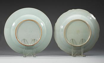 A set of four (2+2) famille rose 'double peacock' dinner plates, Qing dynasty, Qianlong (1736-95).