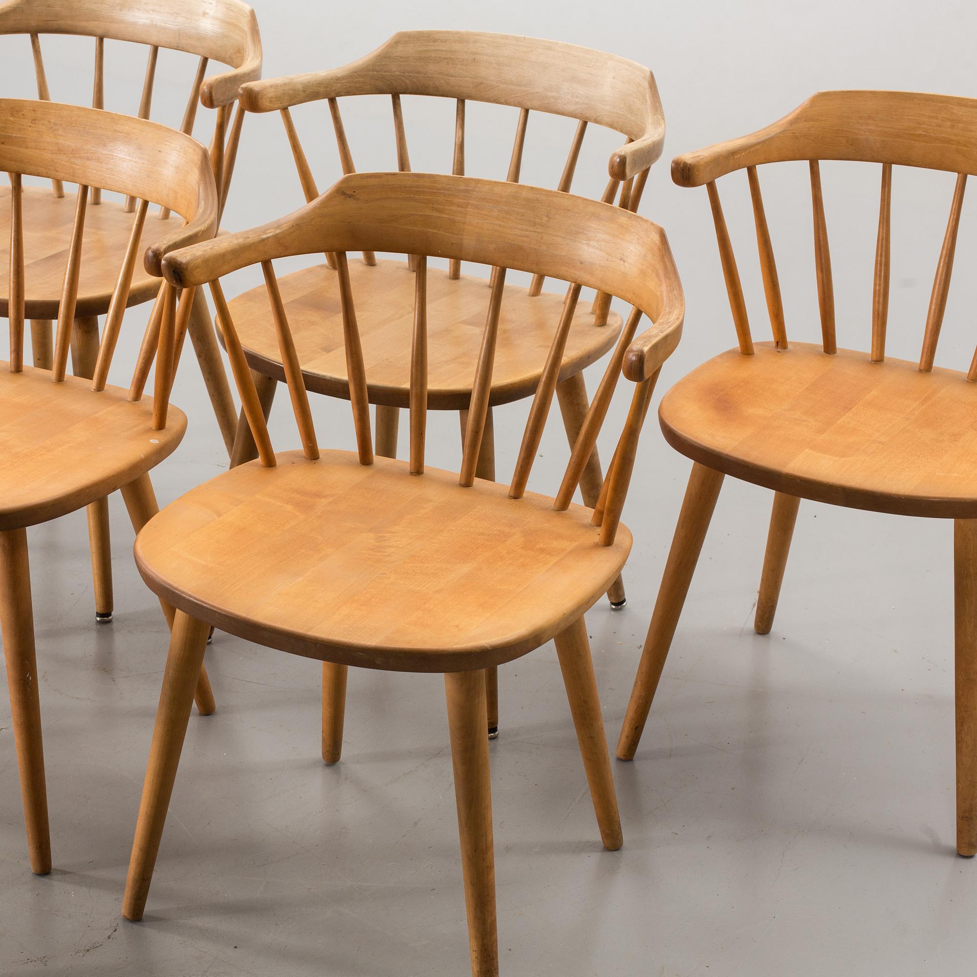 A SET OF EIGHT "SMÅLAND" CHAIRS DESIGNED BY YNGVE EKSTRÖM.