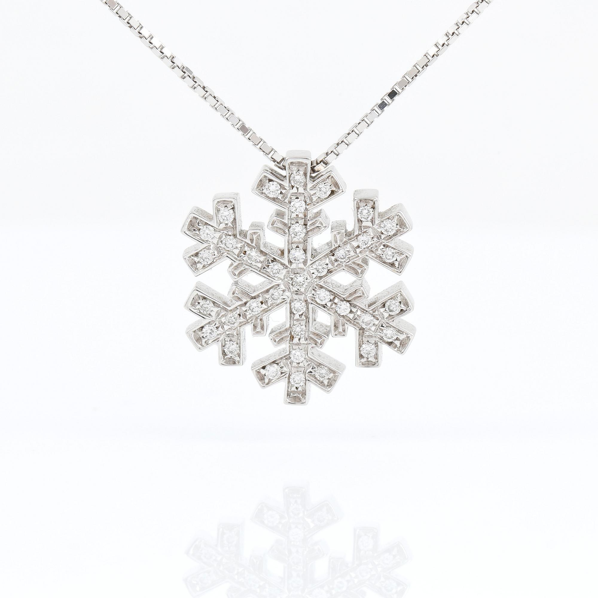 HÄNGE, Salvini, Italien, 18K vitguld, en snöflinga med briljanter ca 0.34ct.