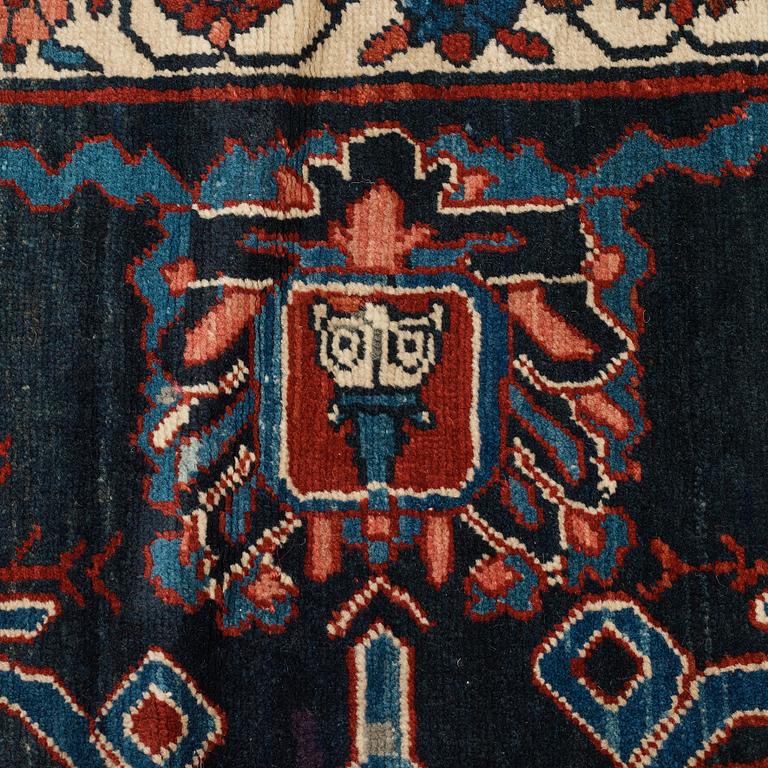 A CARPET, an antique Bakshaish, ca 693 x 398,5 cm, dated "1298"AH/1880 AD probably.