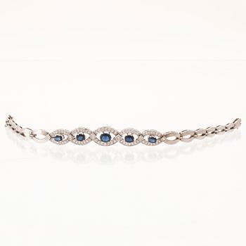 Armband 18K vitguld med ovalt fasetterade safirer samt briljantslipade diamanter, Stockholm.