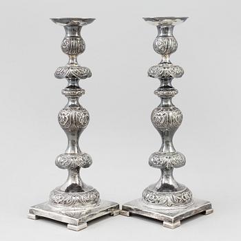 A pair of silver Sabbath candlesticks, Maker M. Sztern, Warsaw, Poland. Assayer Josef Sosnkowski, 1864. Weight 833 g.