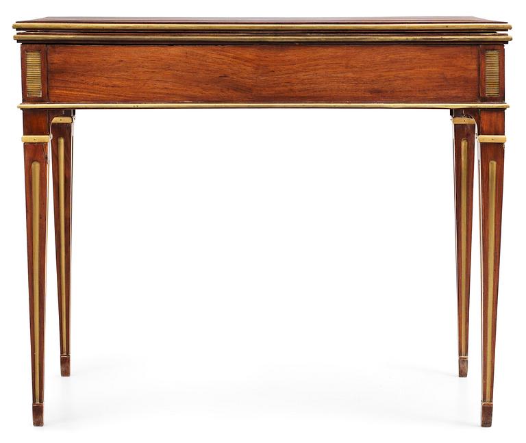 A North European late 18th century mahogany veneered game table.