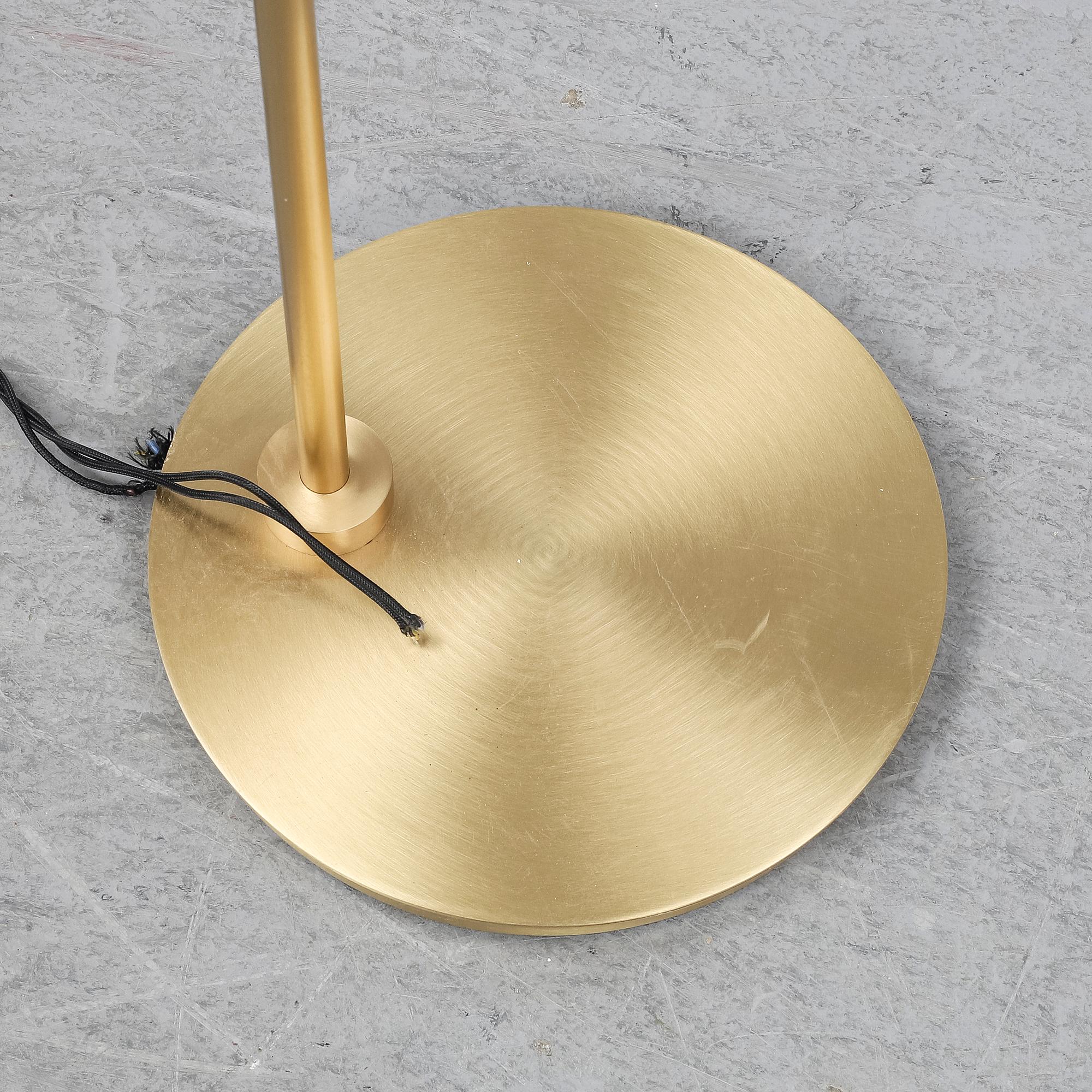 A 'Heron' brass table light by Michael Verheyden for CTO lighting.