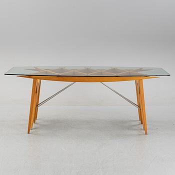 A dining table, Italy 1980-90s.