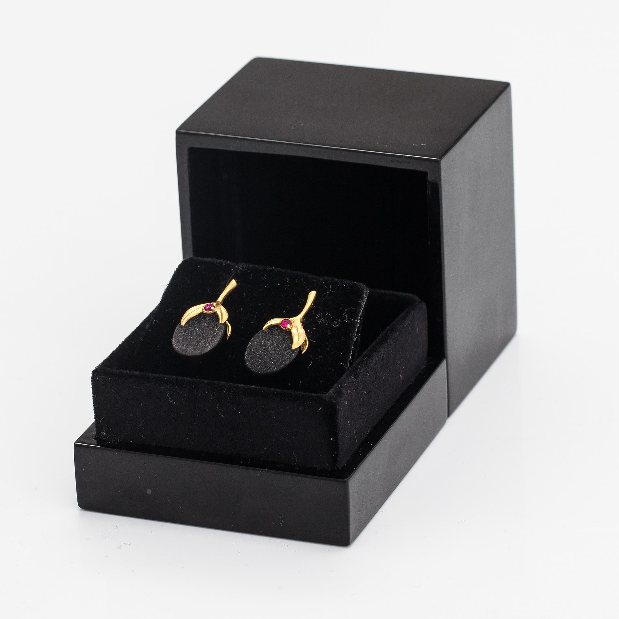 Annoushka, A pair of 18K gold earrings with drusy onyxes and rubies. London.