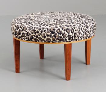 A Josef Frank stool by Svenskt Tenn.