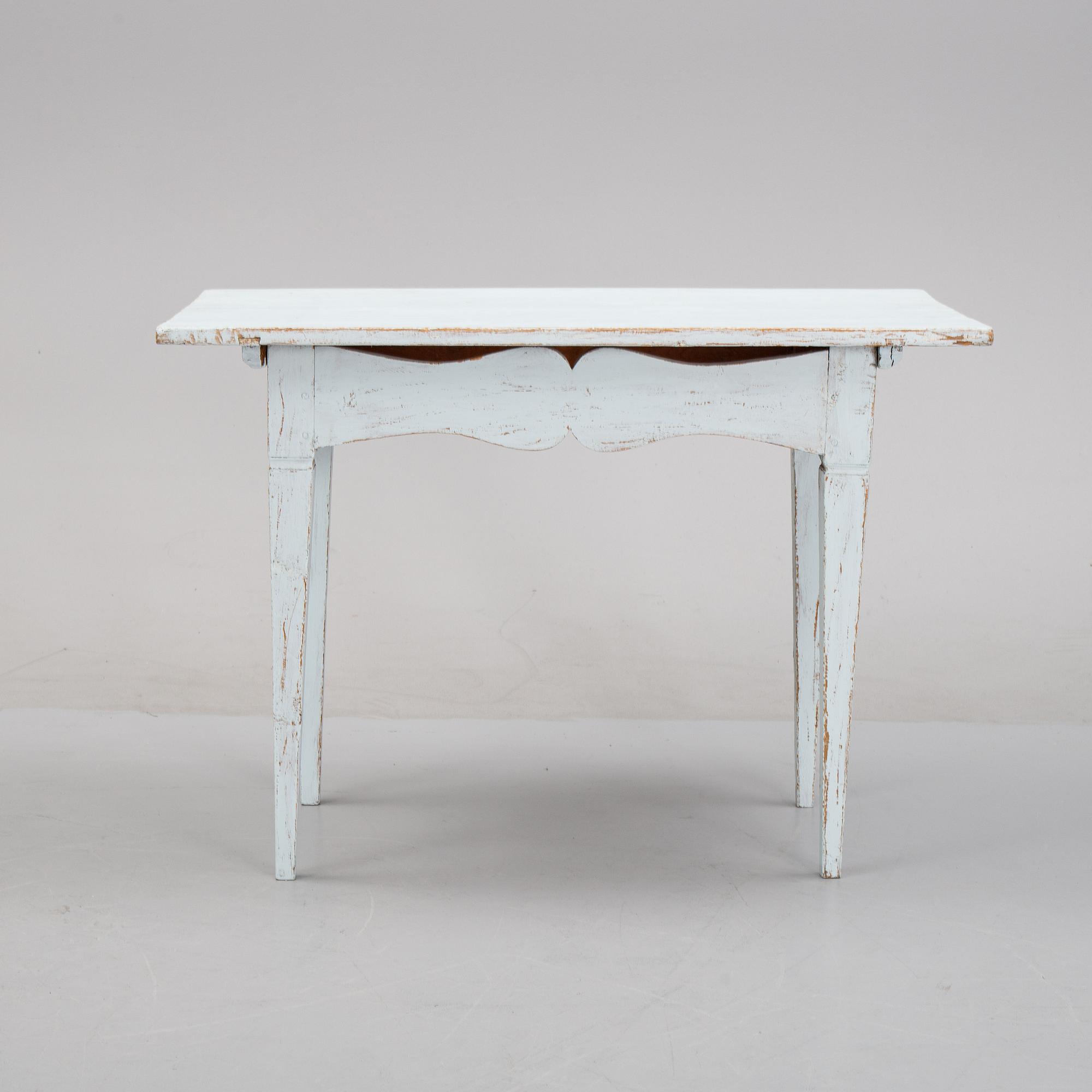 A painted table, 19th Century.