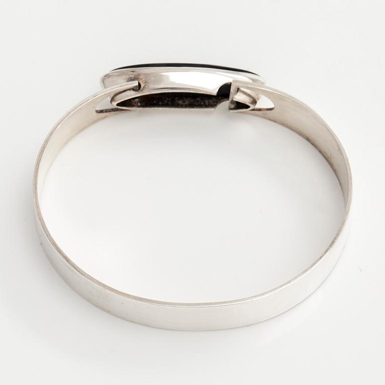 Rannekoru, pyöröhiottu spektroliitti, hopea, Kaunis Koru, 1960-luku.