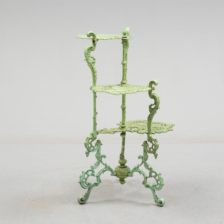 An early 20th century cast iron shelf.