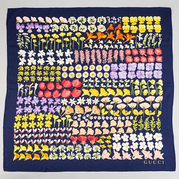 Gucci, a silk scarf.