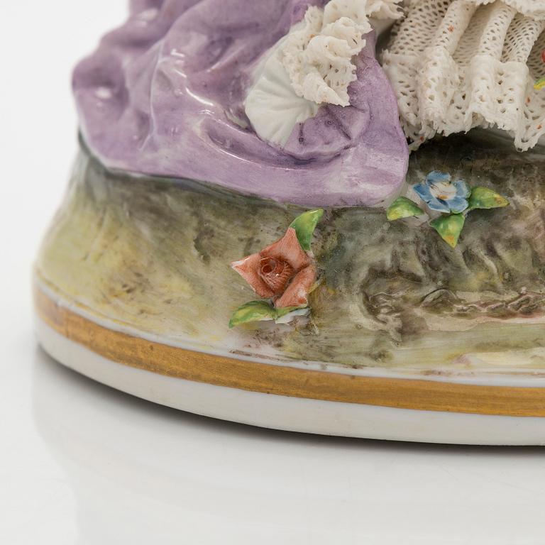 A porcelain lace figurine, Naples style mark, the 20th century.