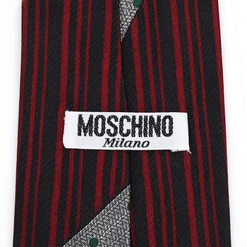 MOSCHINO, a silk tie.