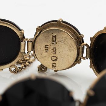 Garniture, mourning jewelry, 4 pieces, late 19th century.