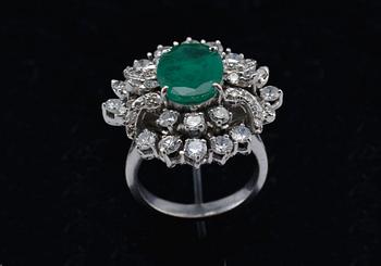 A RING, 8/8 and 16/16 cut diamonds c. 1.50 ct. Emerald c. 2.69 ct. Weight 10 g. Gemmological certificate.