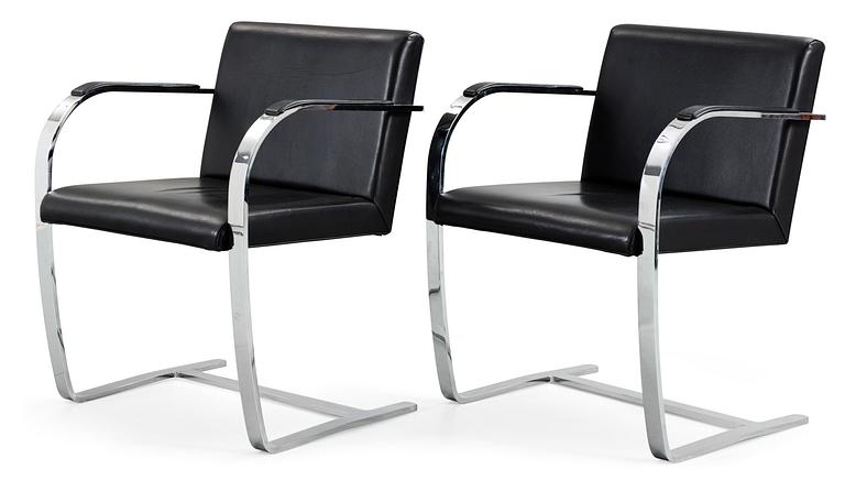 A pair of Ludwig Mies van der Rohe 'Brno' black leather and steel armchairs, Knoll International, USA.