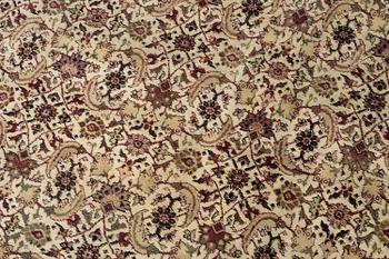 An antique Agra carpet, north India c. 430 x 392 cm.