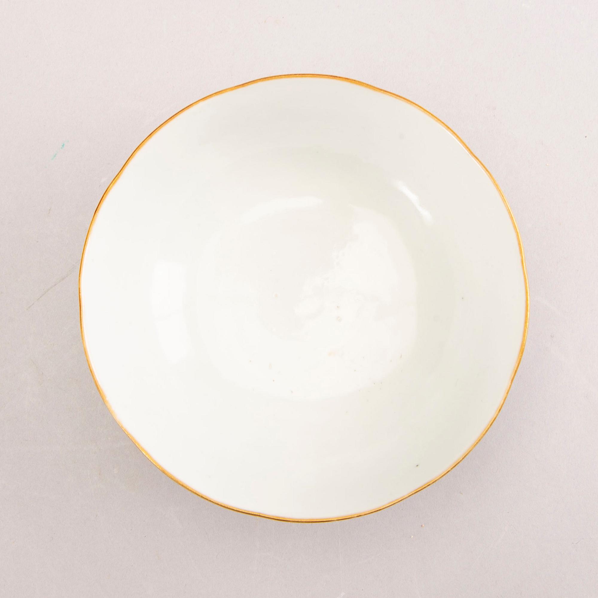 A set of two Japanese porcelain trays and a bowl 20th century.