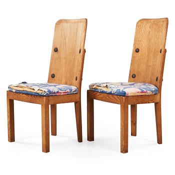 Axel Einar Hjorth, A pair of Axel Einar Hjorth 'Lovö' stained pine chairs, Nordiska Kompaniet, Sweden 1930's.