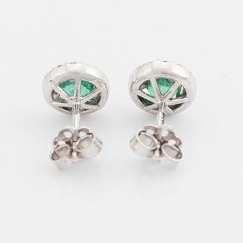 Emerald and brilliant cut diamond earrings.