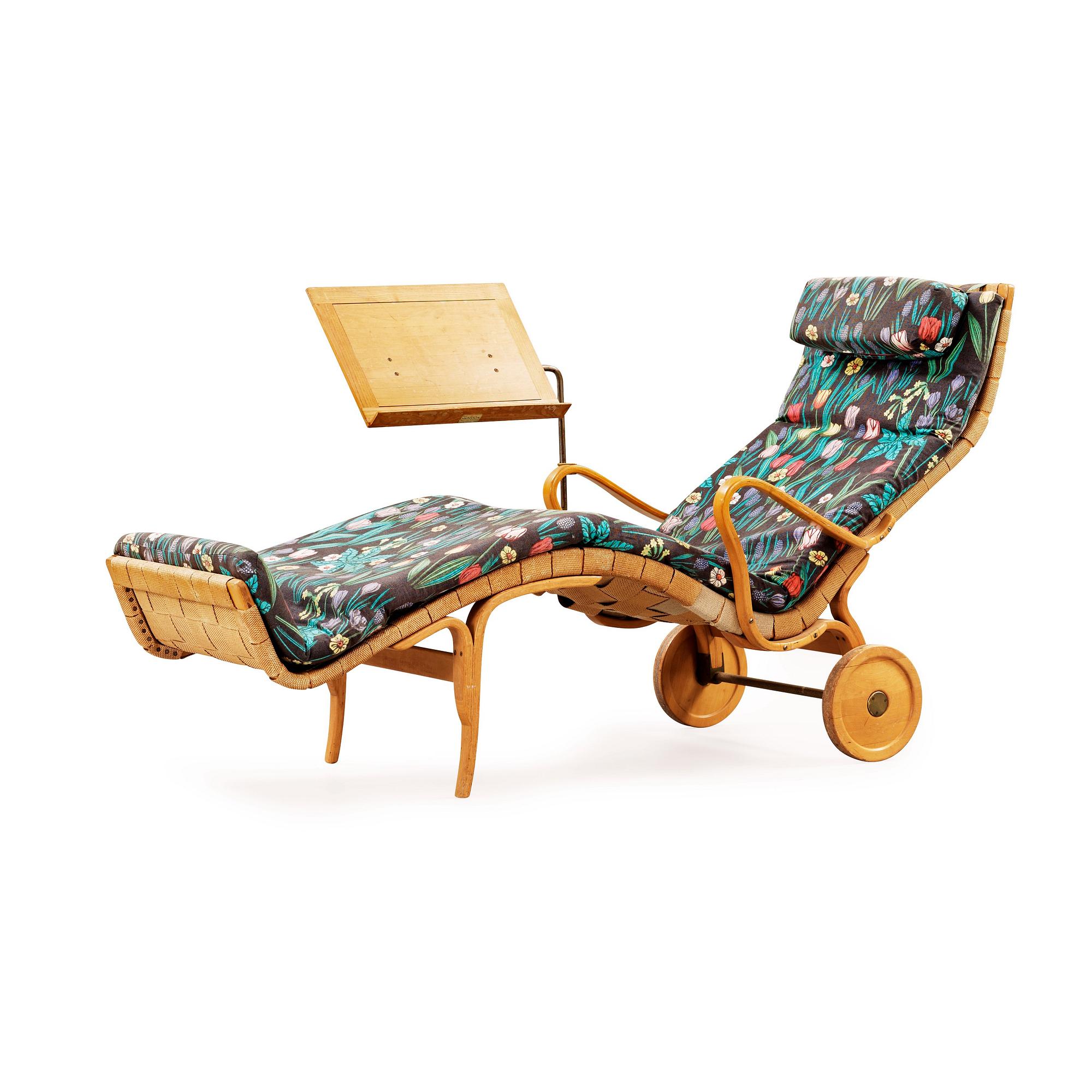 A Bruno Mathsson Swedish Modern chair with attached reading table, Karl Mathsson, Värnamo 1944.