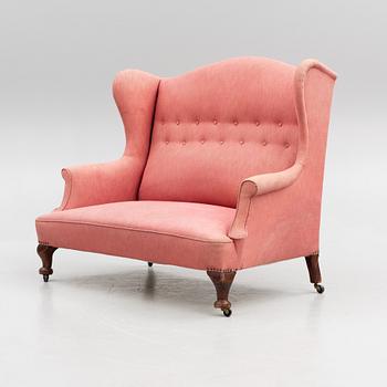 Sofa, circa 1900.