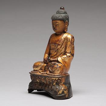 A seated bronze figure of buddha, Ming dynasty (1368-1644).