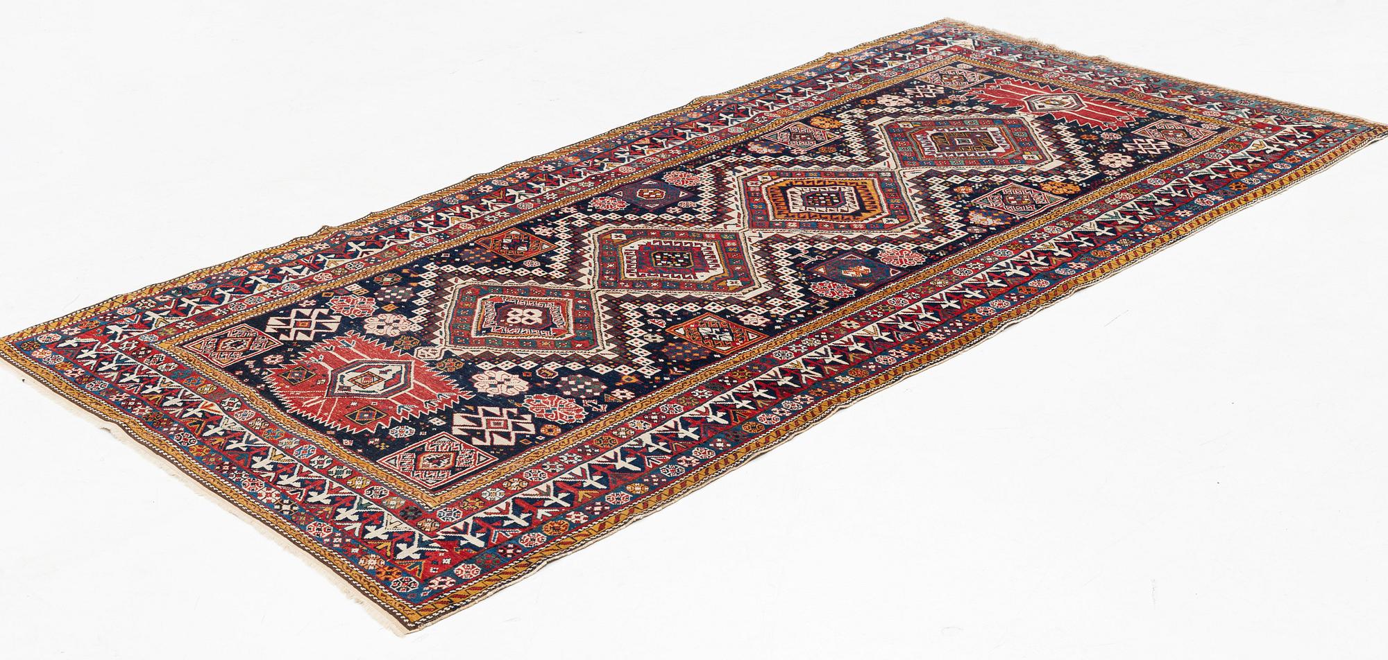 An antique Shirvan carpet. ca 285 x 147 cm.