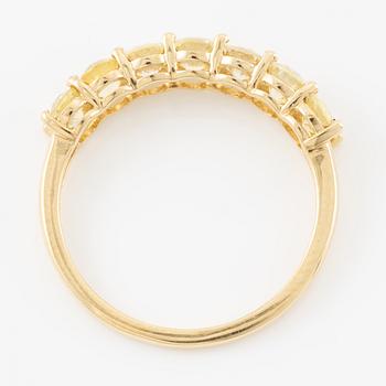 Ring, half eternity, 18K gold with yellow sapphires.