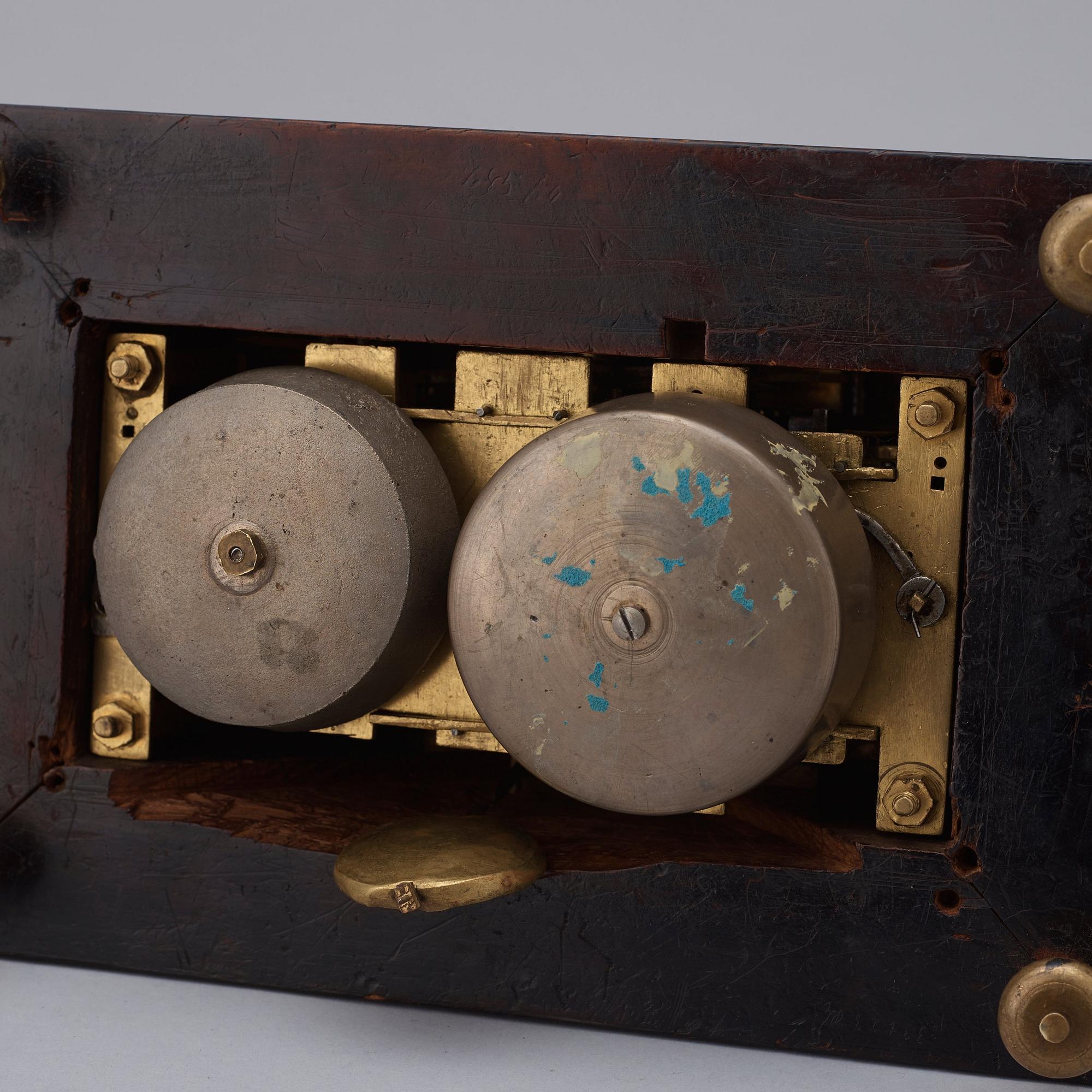 A rare gilt brass on ebonised base Lion Automaton figure clock, Augsburg circa 1630.