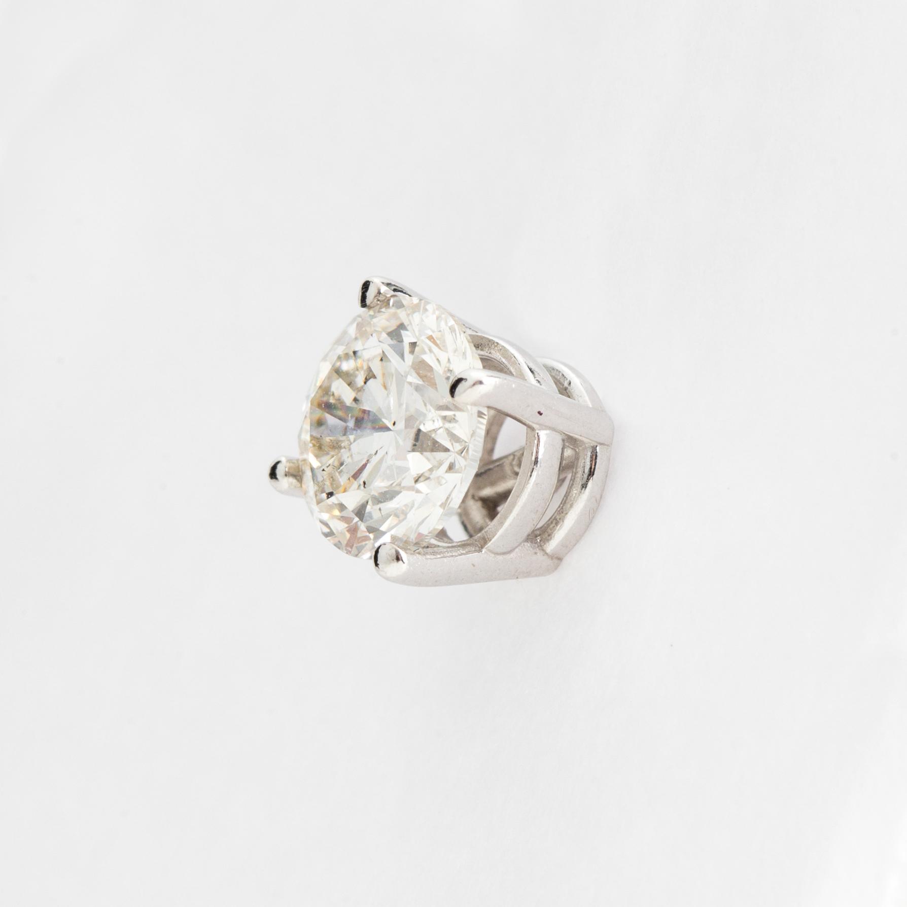 DIAMOND STUDS, 14K white gold with 2 diamonds approx. 1.40 cts.