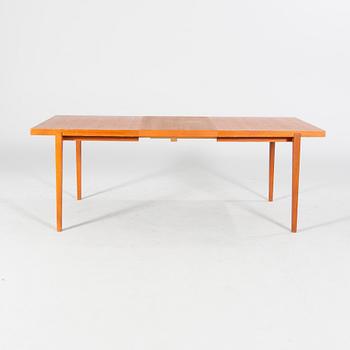 A mid 20th century dining table.