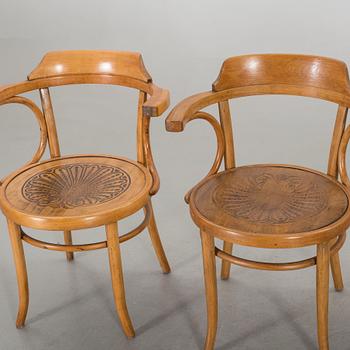 A set of four Cosmos arm chairs first half of the 20th century.