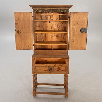 An oak cabinet dated 1786.