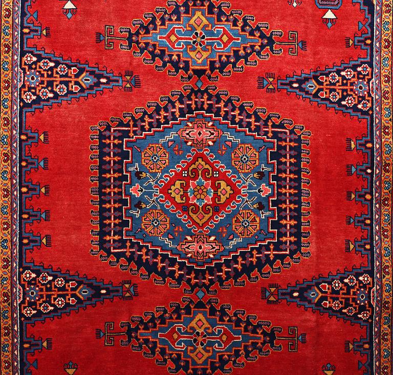 A CARPET, Wiss Signed Sharbani.  327 x 227 cm.