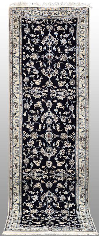 A Nain runner, part silk, approx. 294 x 90 cm.