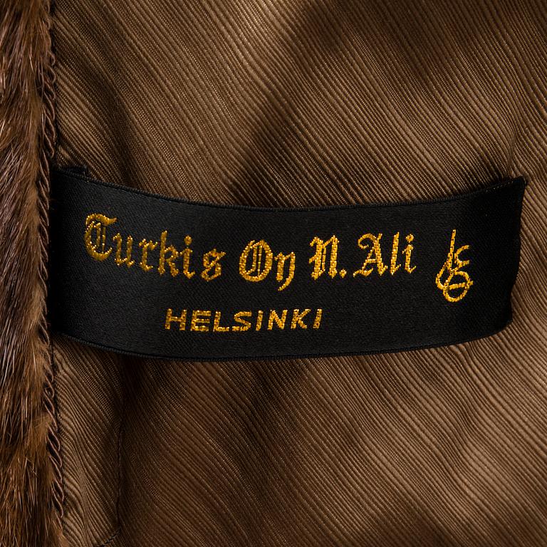 A SAGA MINK FUR COAT.