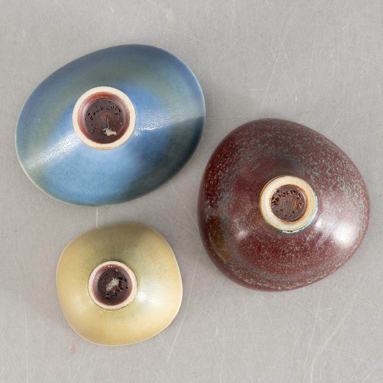 Berndt Friberg, a set of four stoneware miniature vases and three bowls, Gustavsberg Studio.