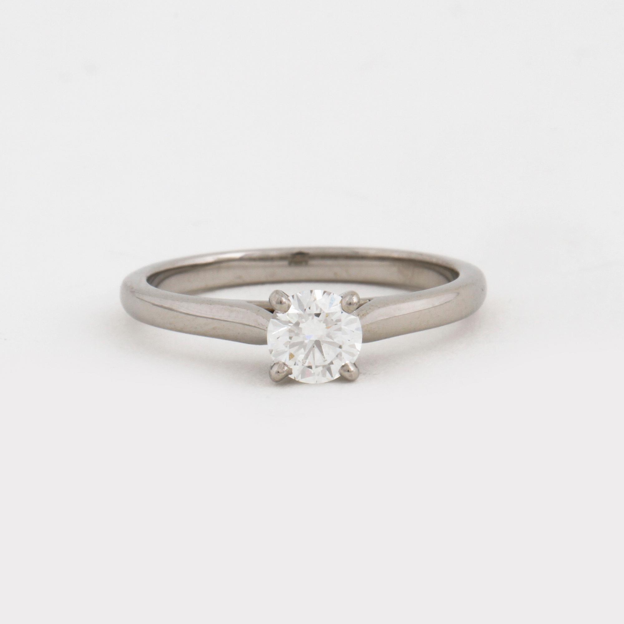 A brilliant cut diamond ring by Cartier.